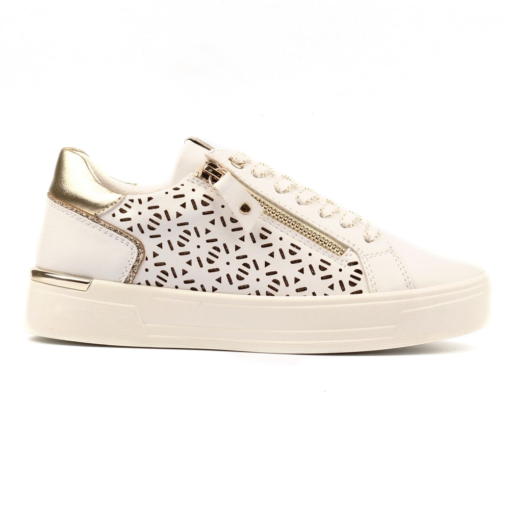 White sneaker with gold accents on a white background